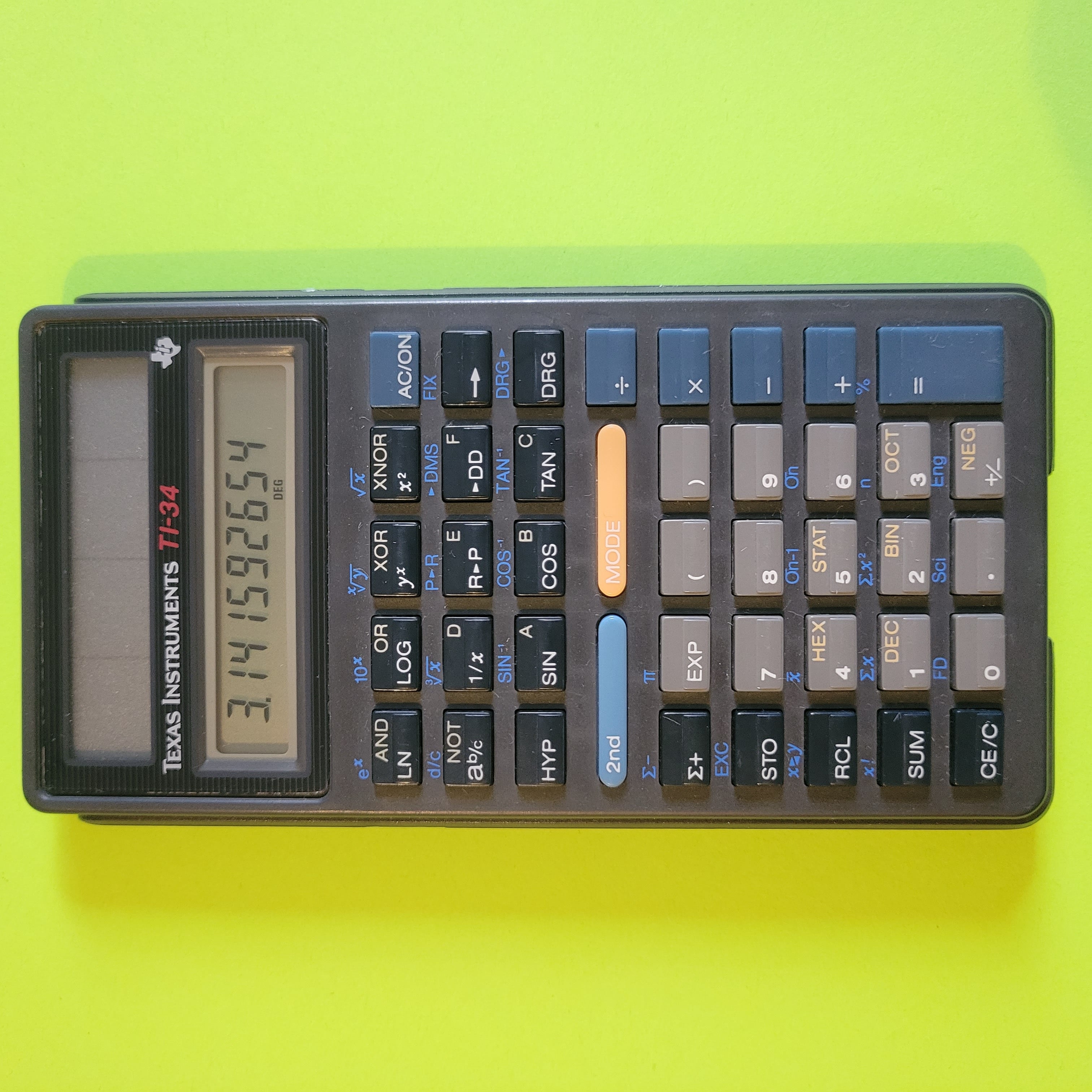an image of a texas instruments ti-34 scientific/engineering calculator